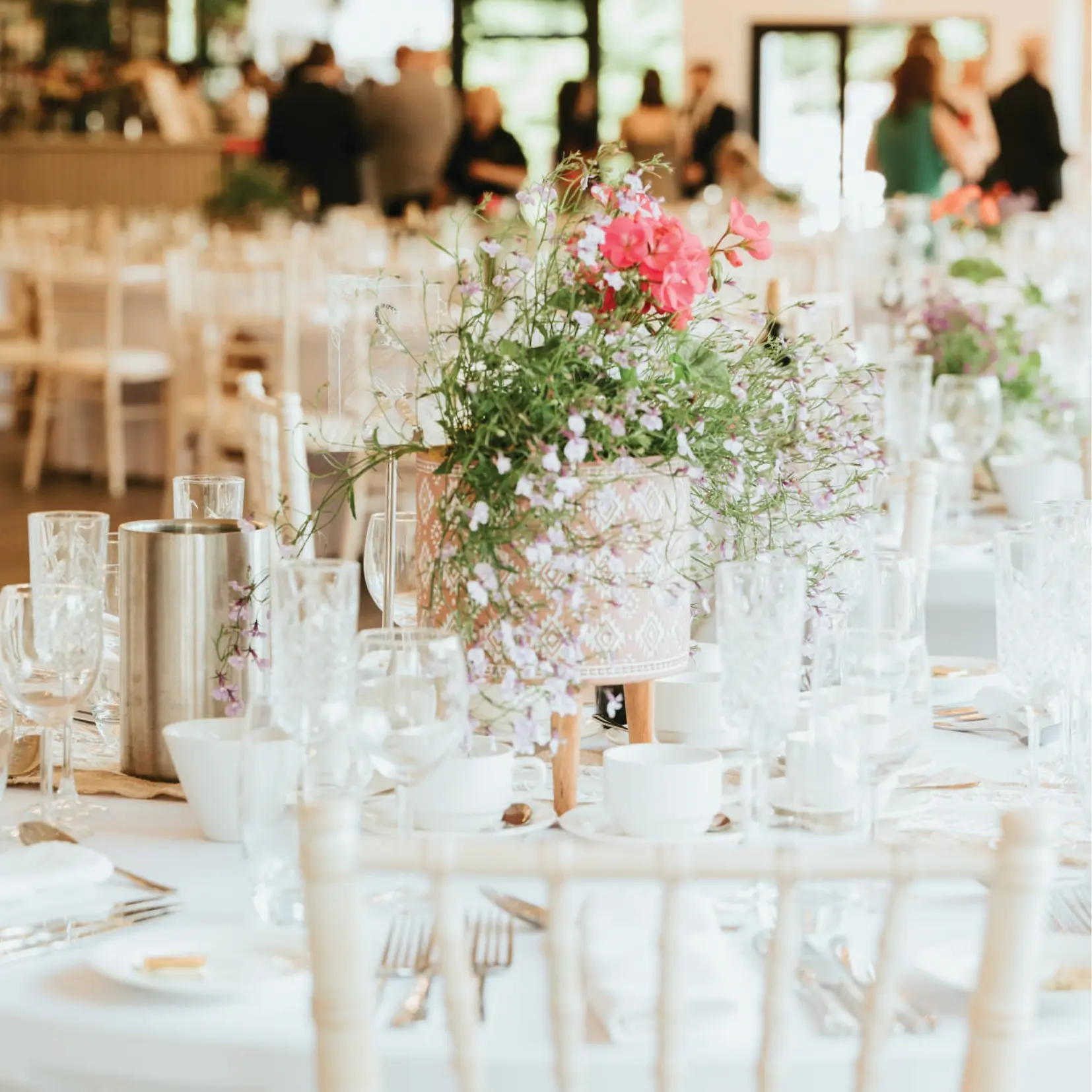 Wedding tables styled with wildflowers